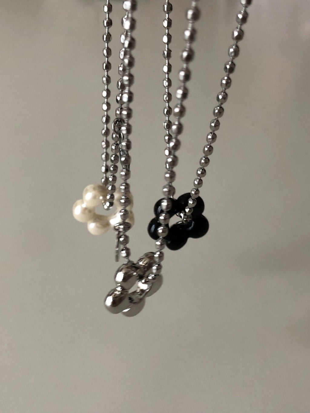 military emblem flower necklace