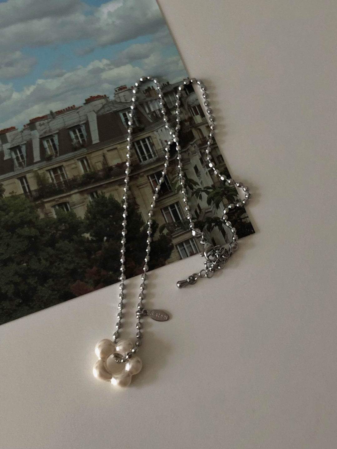 military emblem flower necklace