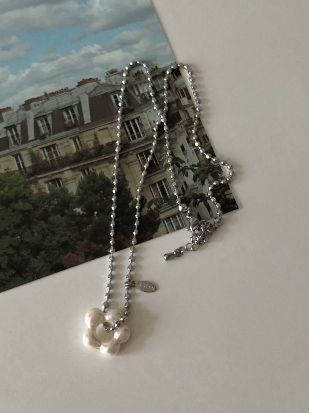 military emblem flower necklace