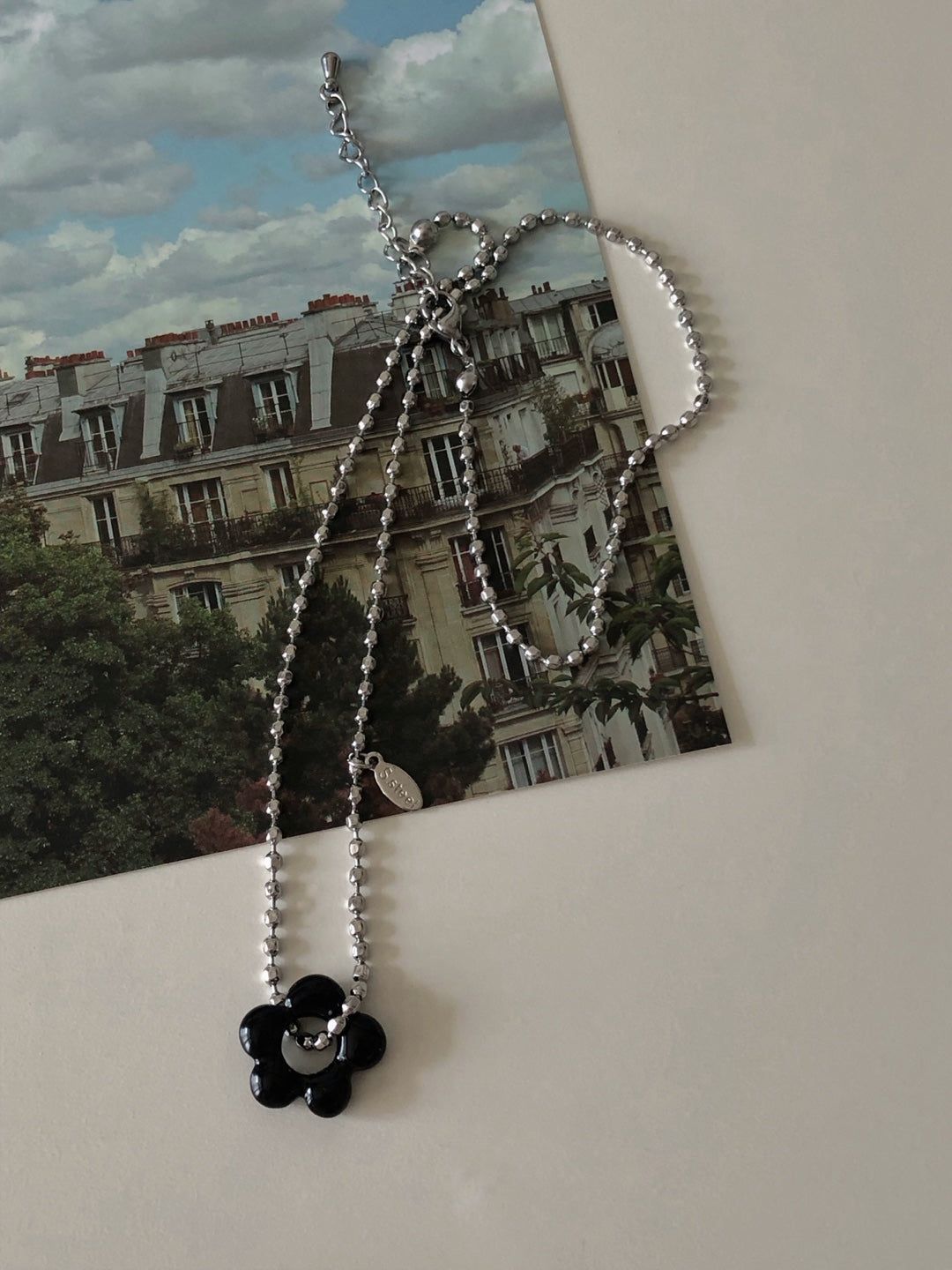 military emblem flower necklace