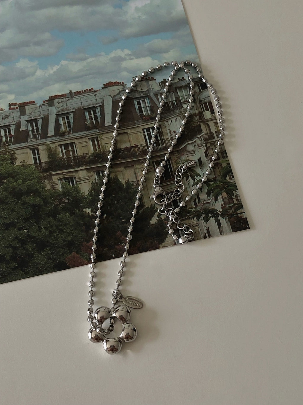 military emblem flower necklace