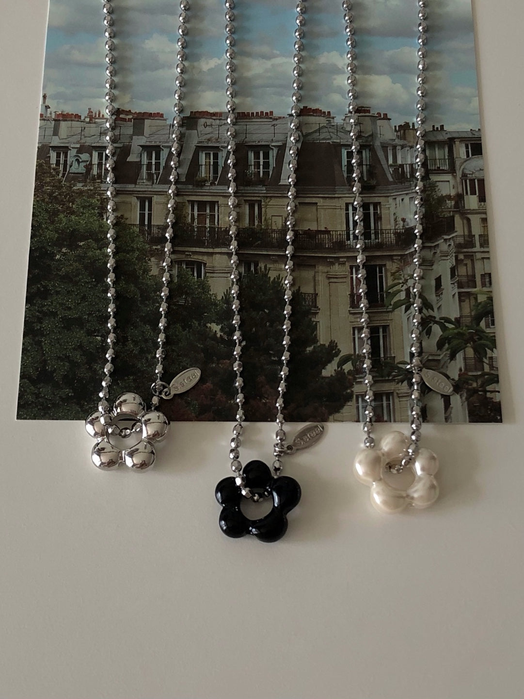 military emblem flower necklace