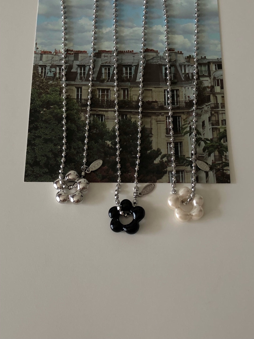 military emblem flower necklace