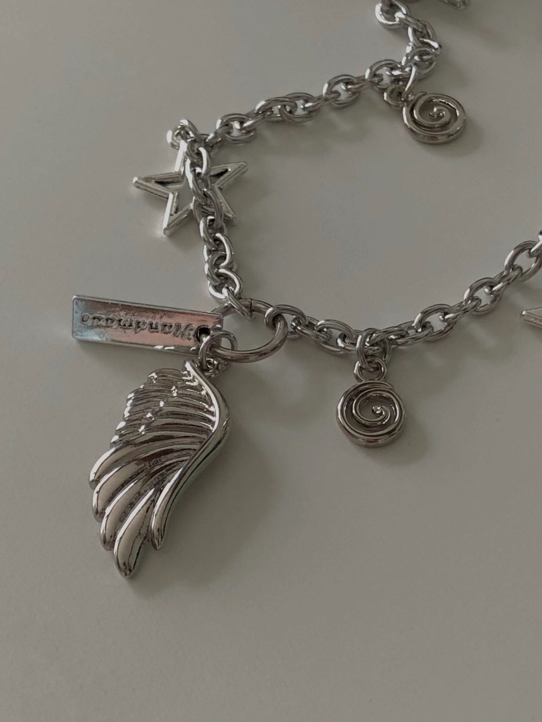 toggle bar angel wing chain bracelet