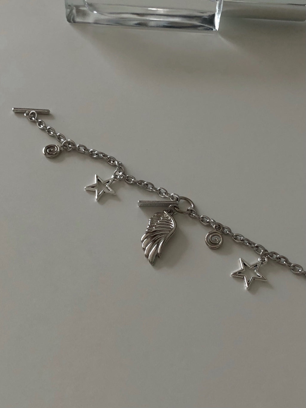 toggle bar angel wing chain bracelet