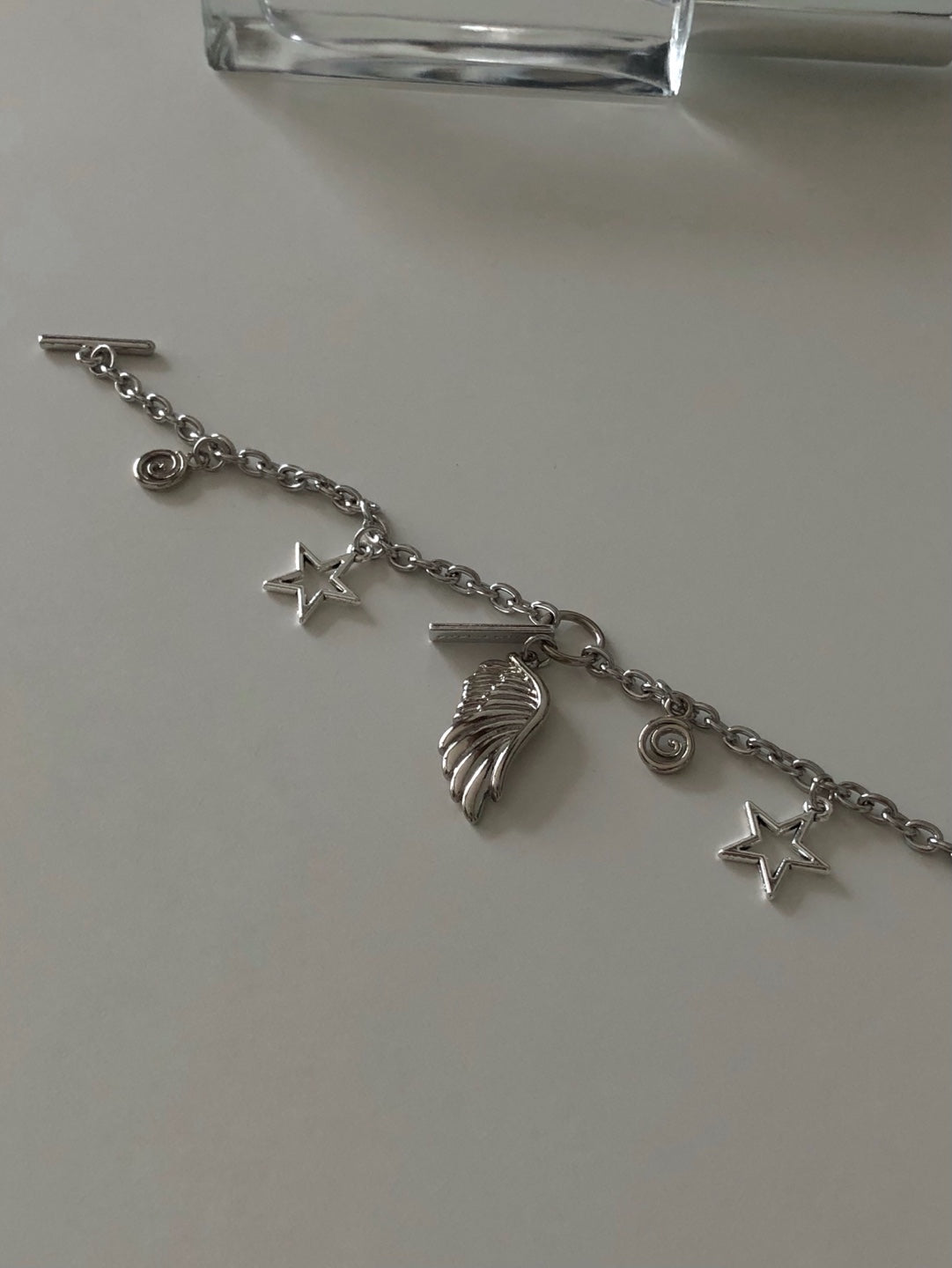 toggle bar angel wing chain bracelet