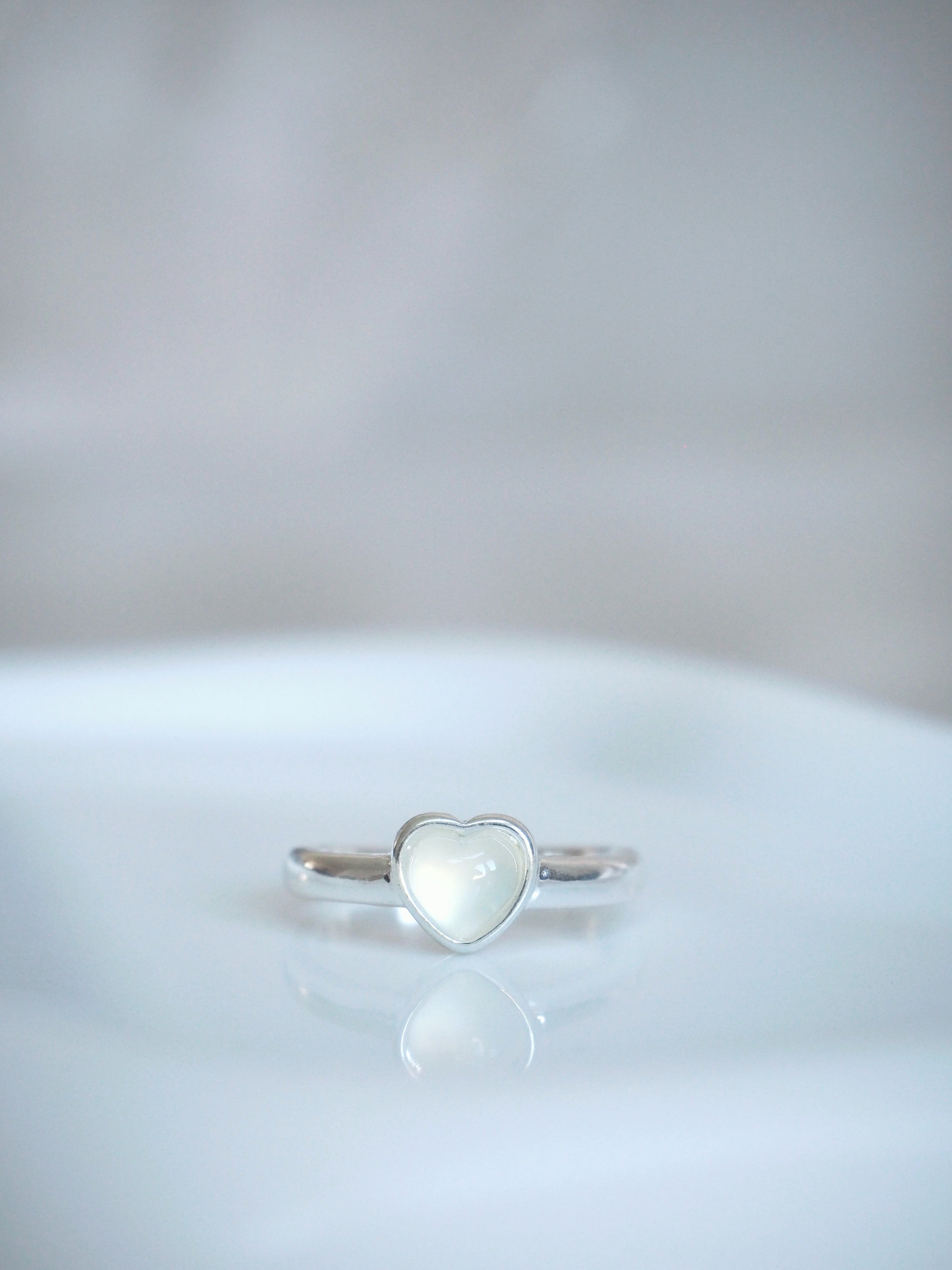 milky heart gemstone ring