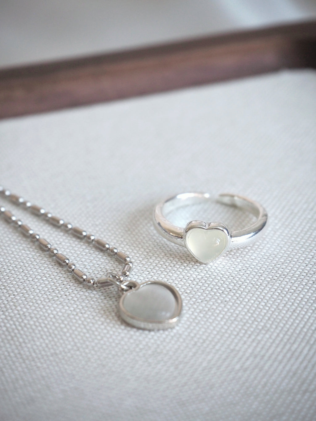 milky heart gemstone ring