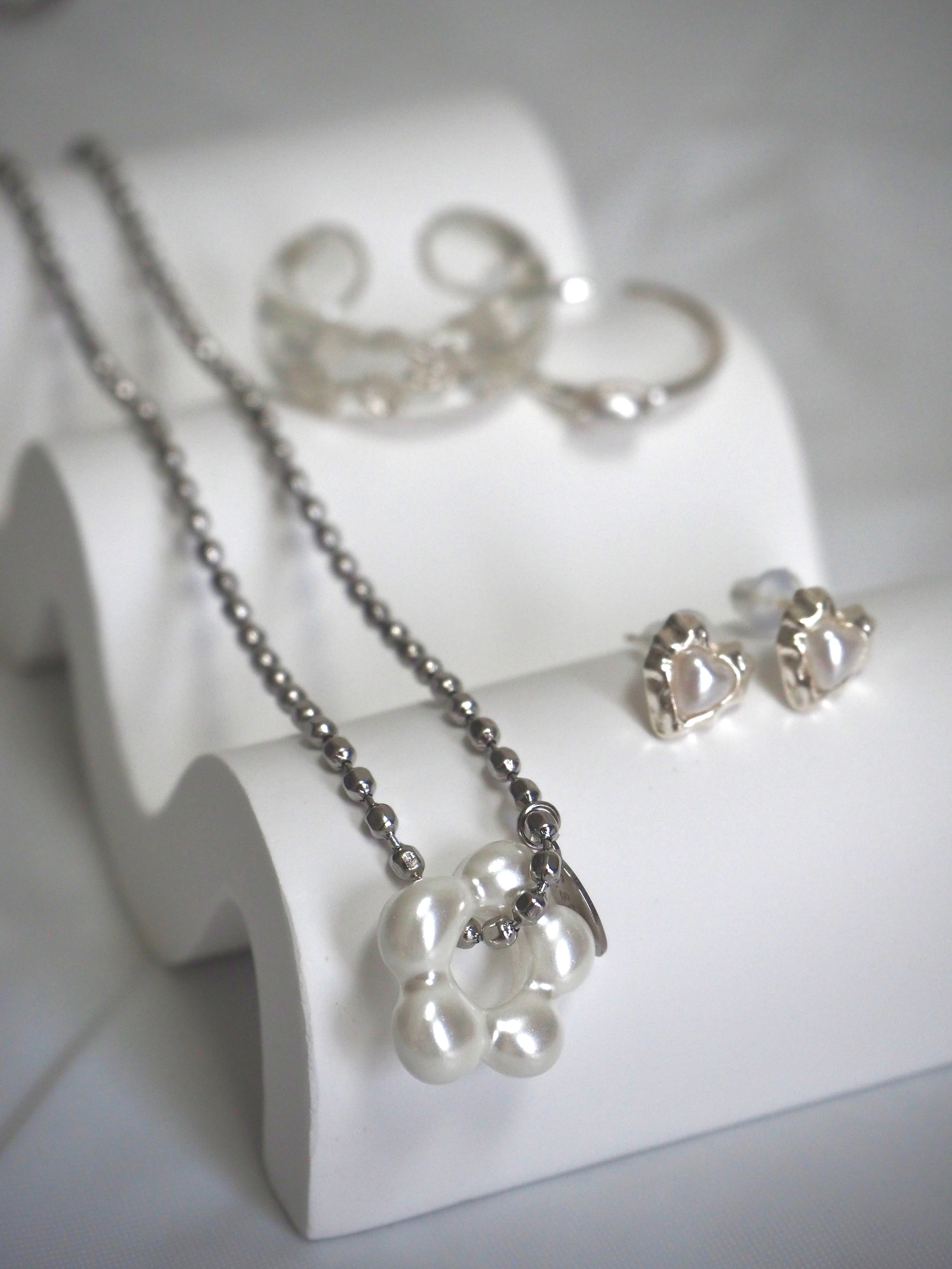 military emblem flower necklace