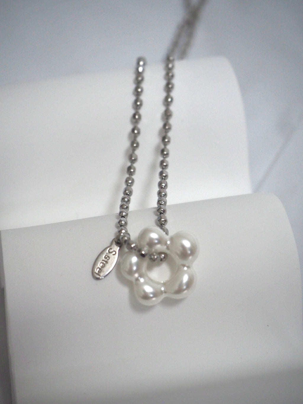 military emblem flower necklace