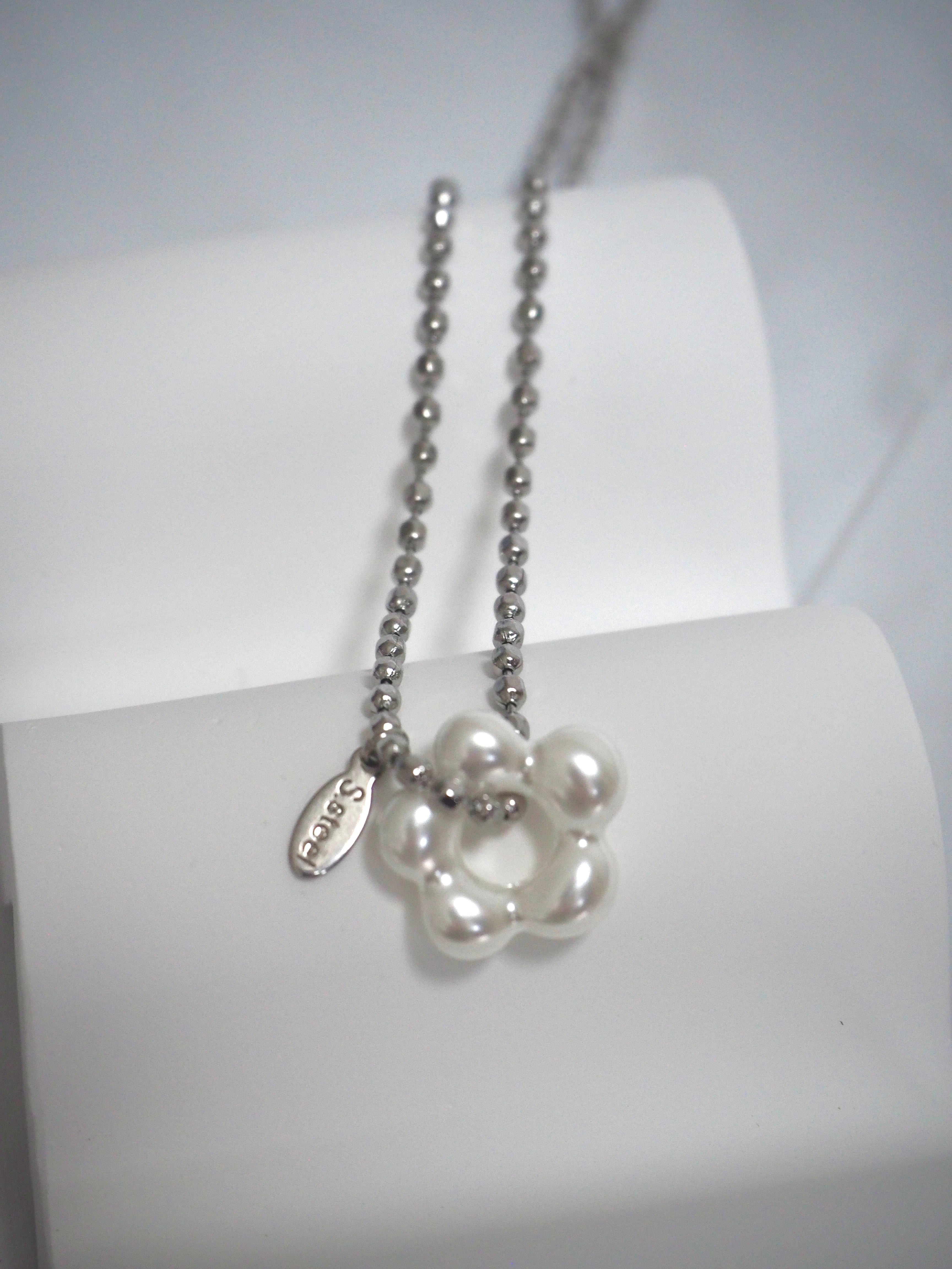 military emblem flower necklace