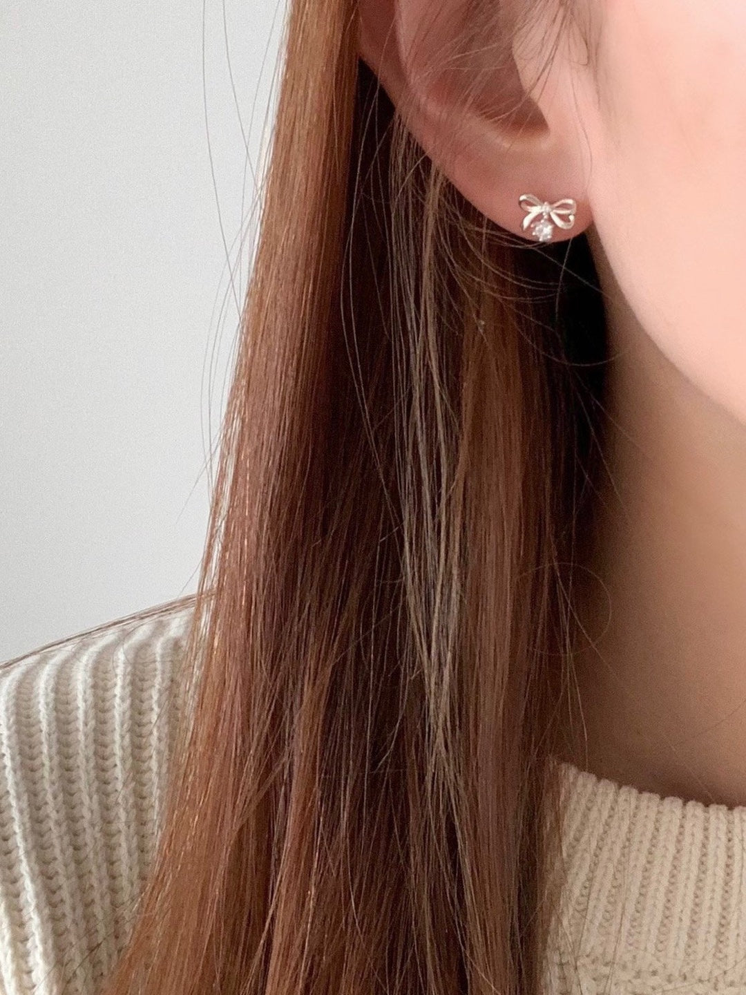 [925silver] ribbon cubic zirconia earrings