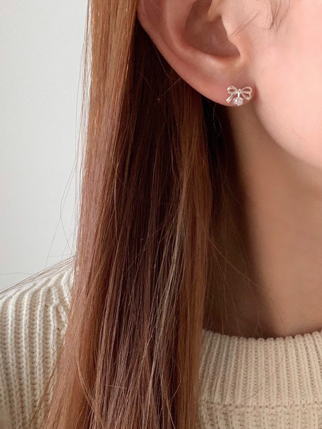 [925silver] ribbon cubic zirconia earrings