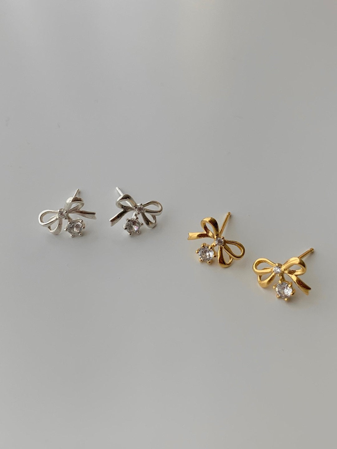 [925silver] ribbon cubic zirconia earrings