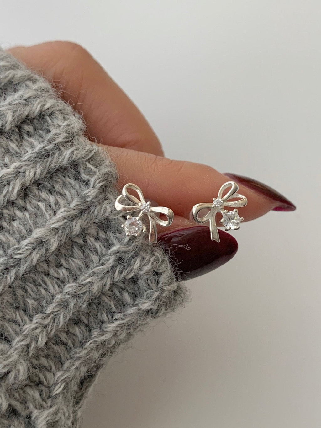 [925silver] ribbon cubic zirconia earrings